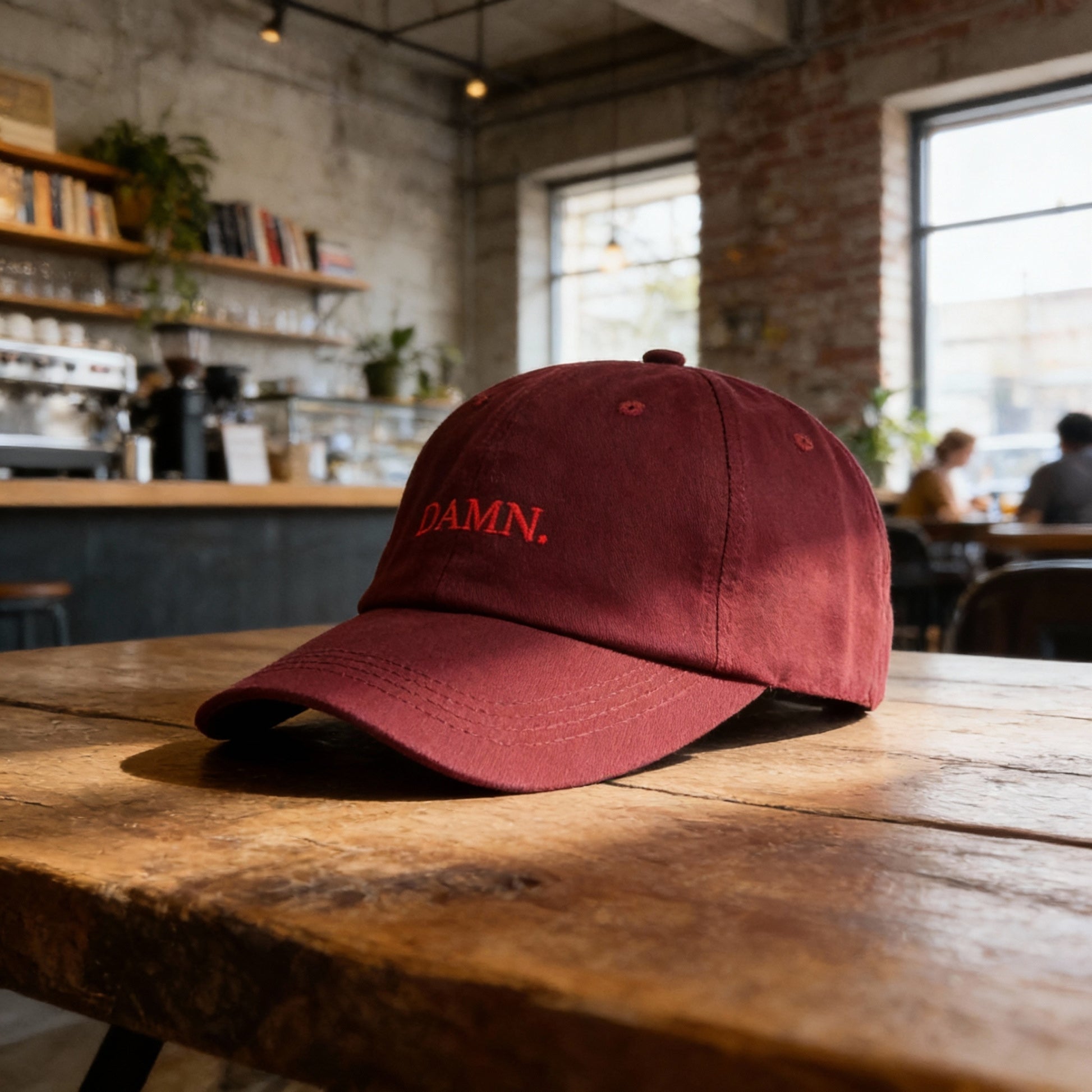 Casual elegance with a strong identity. Crafted from high-quality fabric, the “DAMN.” cap is the statement detail that enhances any outfit with authenticity and presence.