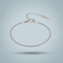 Silver bracelet on a light gray background