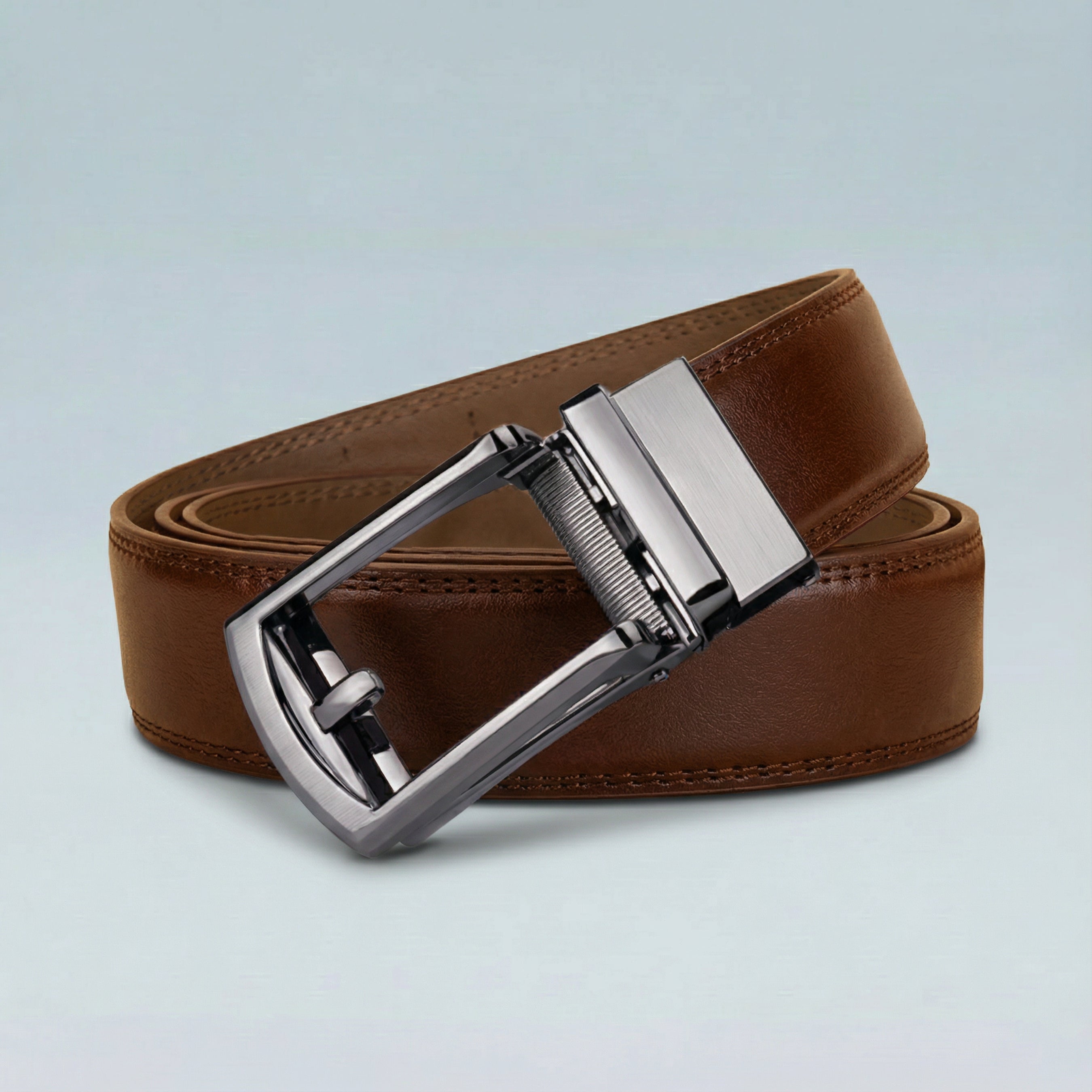 This brown belt, made from premium leather, exudes elegance and versatility. The sleek metal buckle perfectly complements any outfit, from casual to formal.